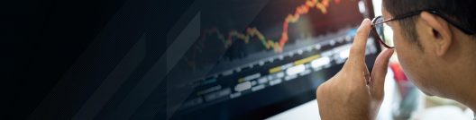 businessman-analyses-stock-market-1147331105